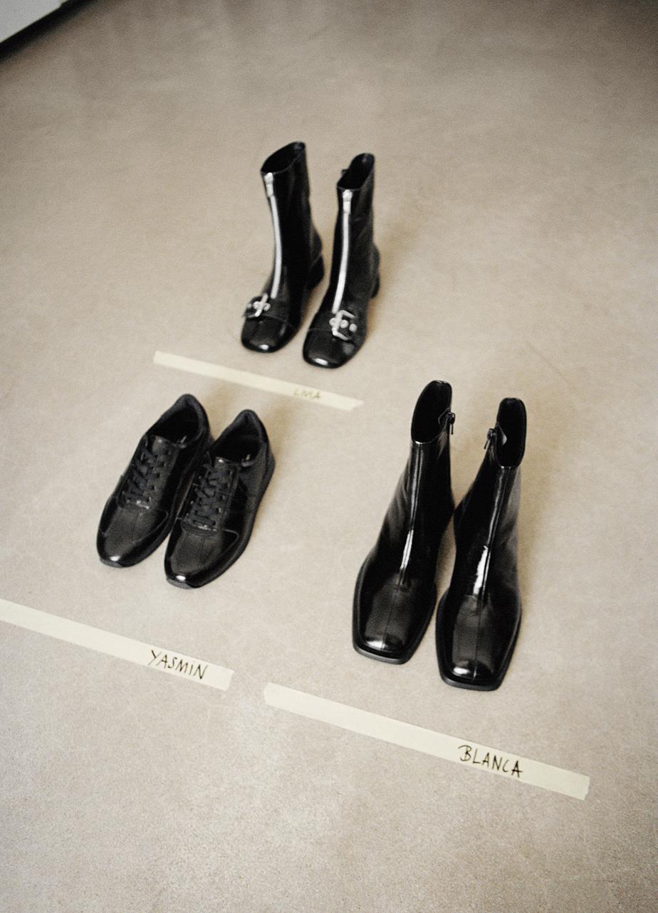 Livia boots, Yasmin sneakers and Blanca boots standing on the floor