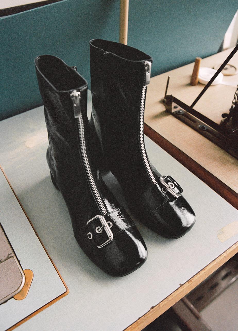 A pair of Livia boots on a table