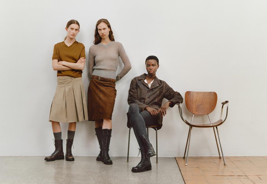 Three women showcase different varieties of Karlie Boots, seated and standing in front of a white wall