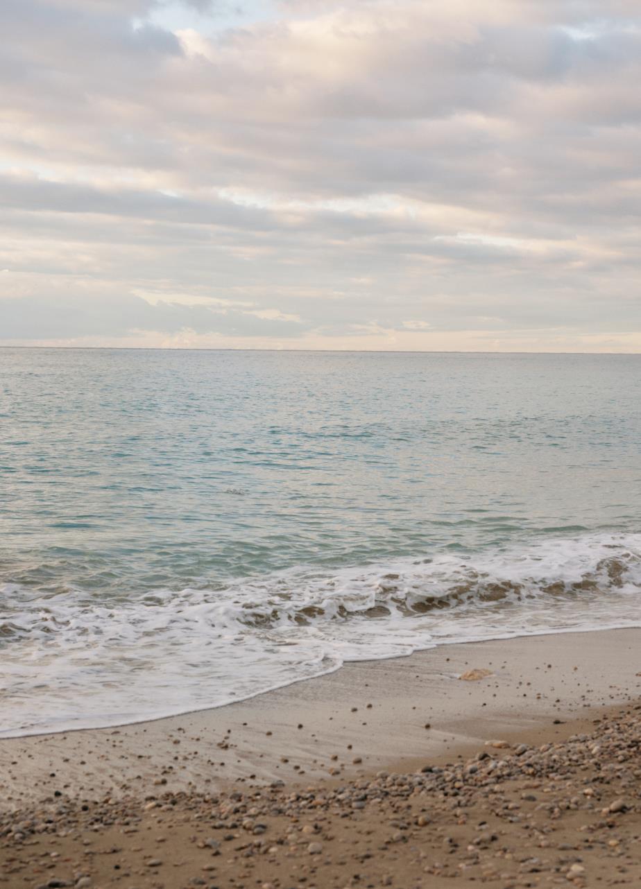 A picture of the sea and the waves rolling onto the shore