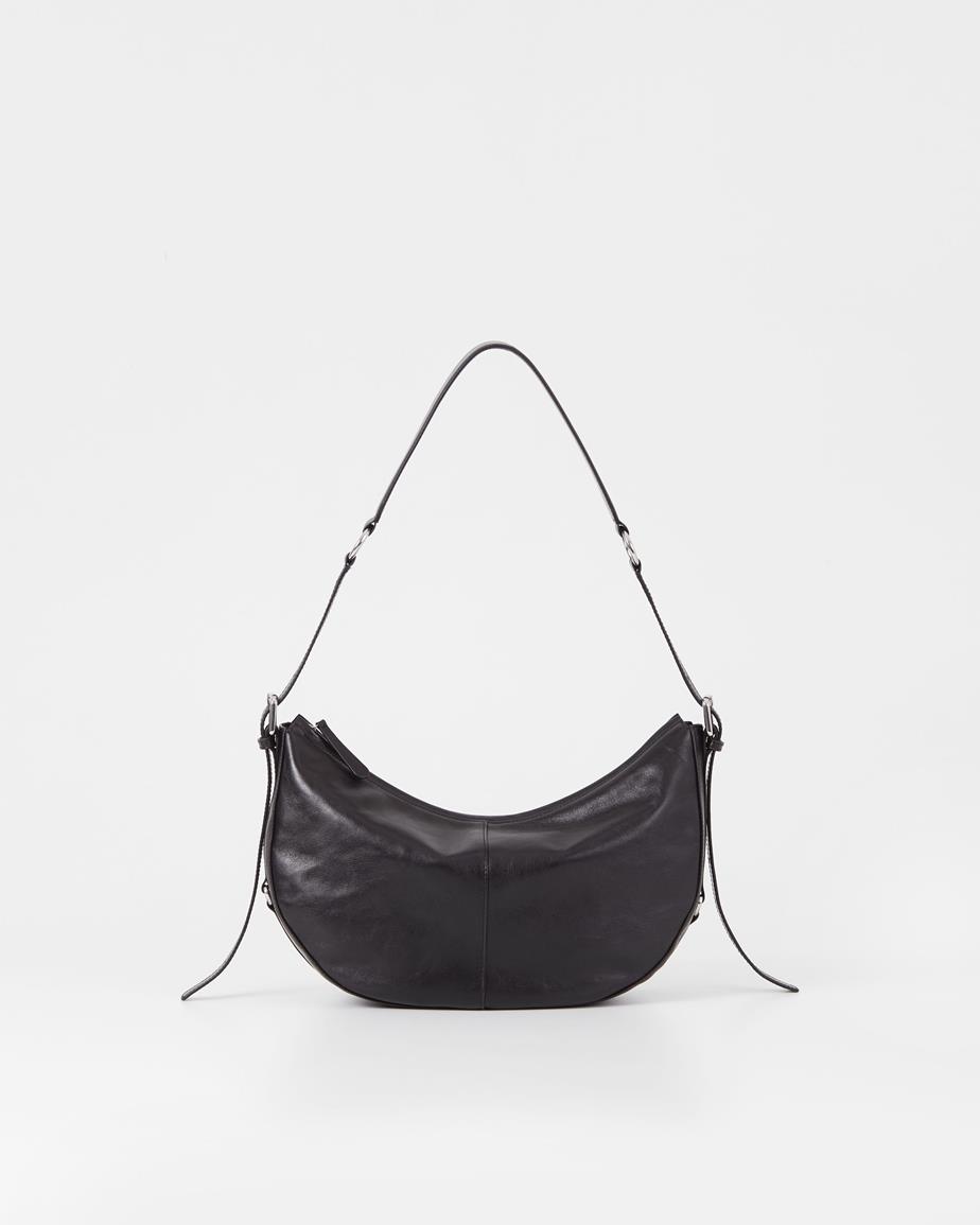 Itami tas Zwart, Leer