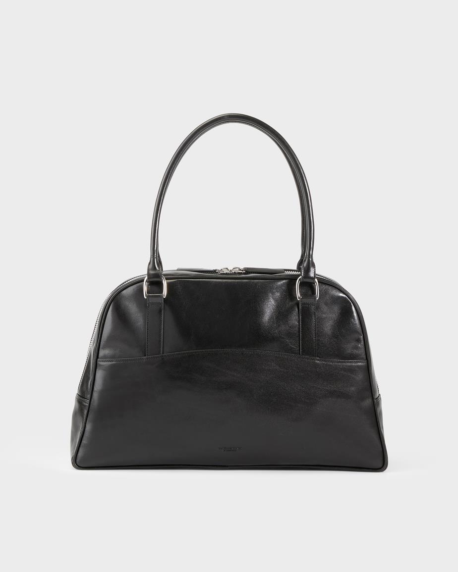 Nomi sac Noir, Cuir