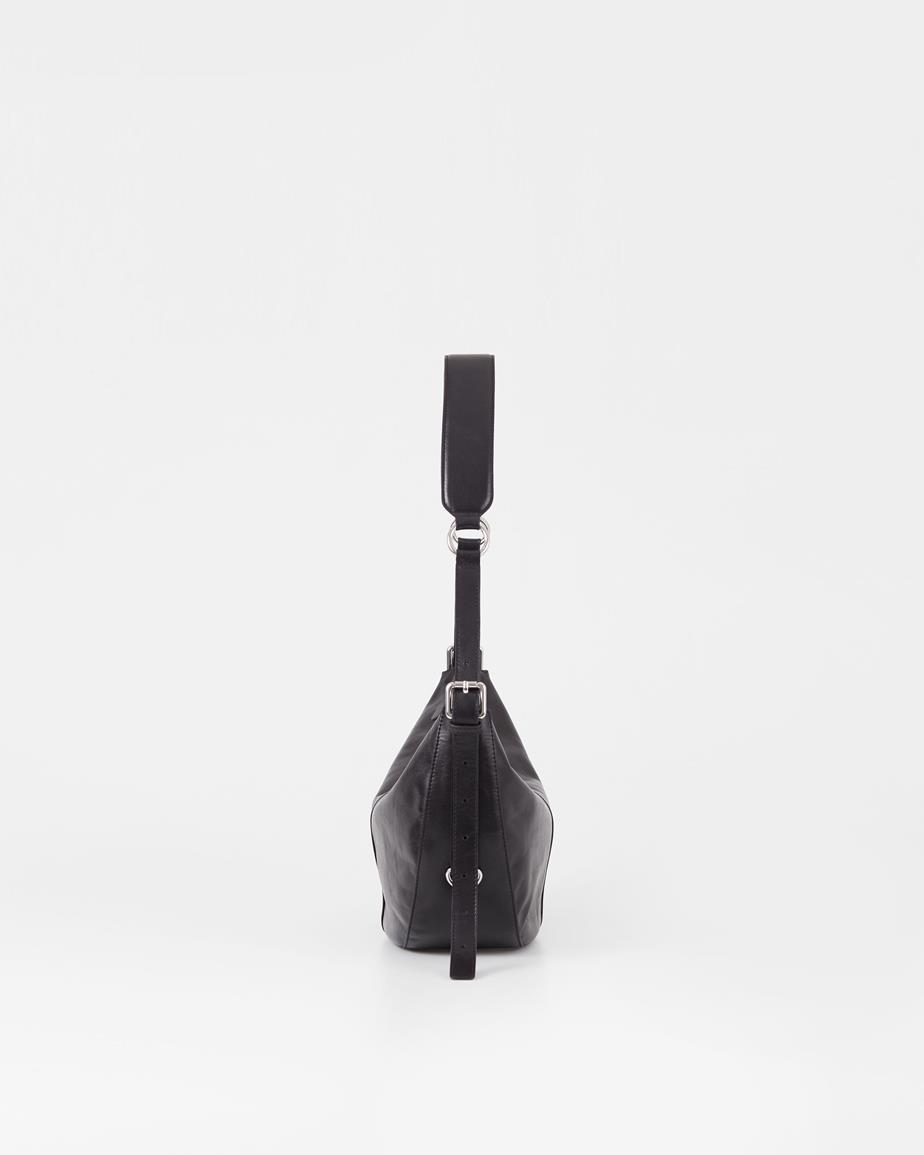 Itami tas Zwart, Leer