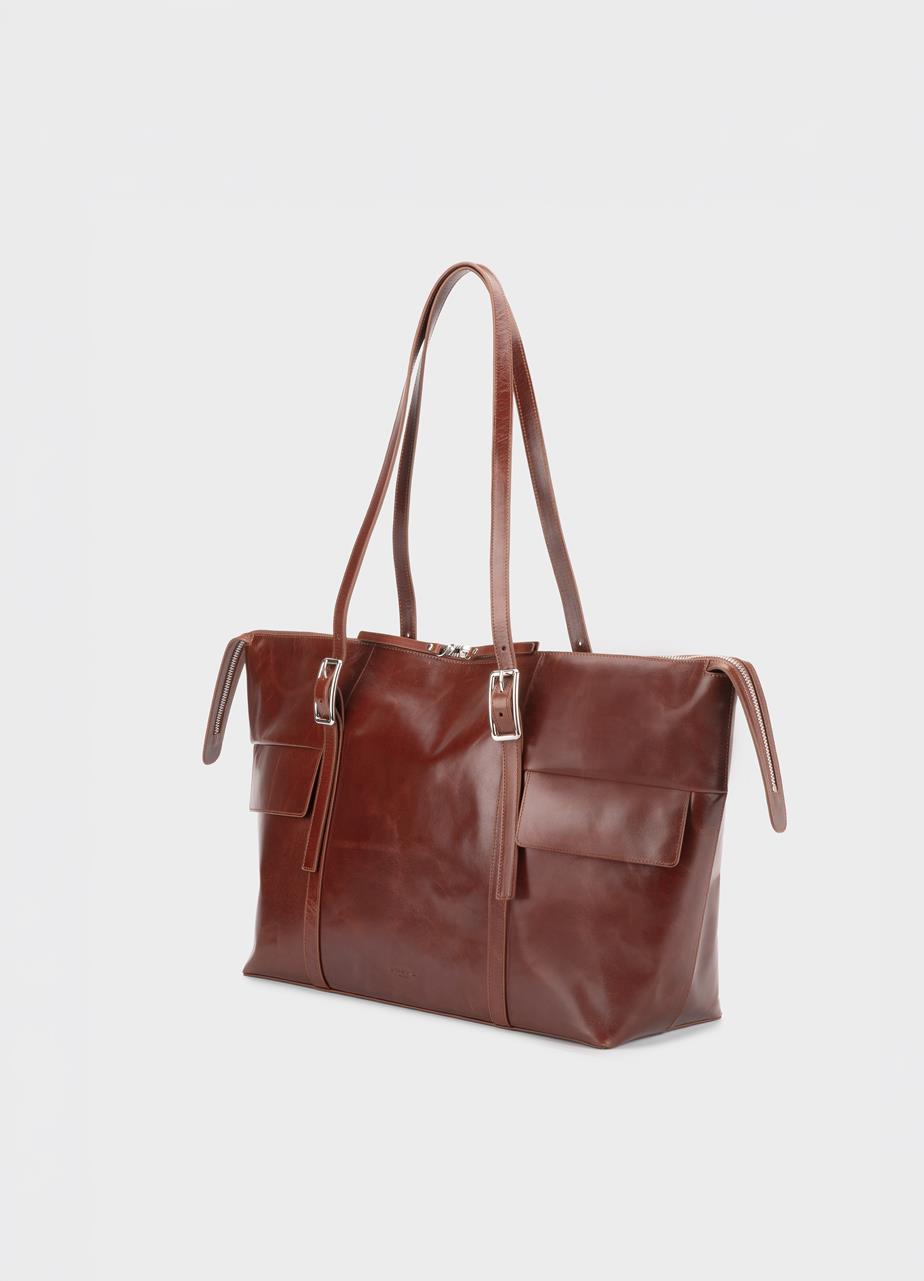 Thira tas Bruin, Leer