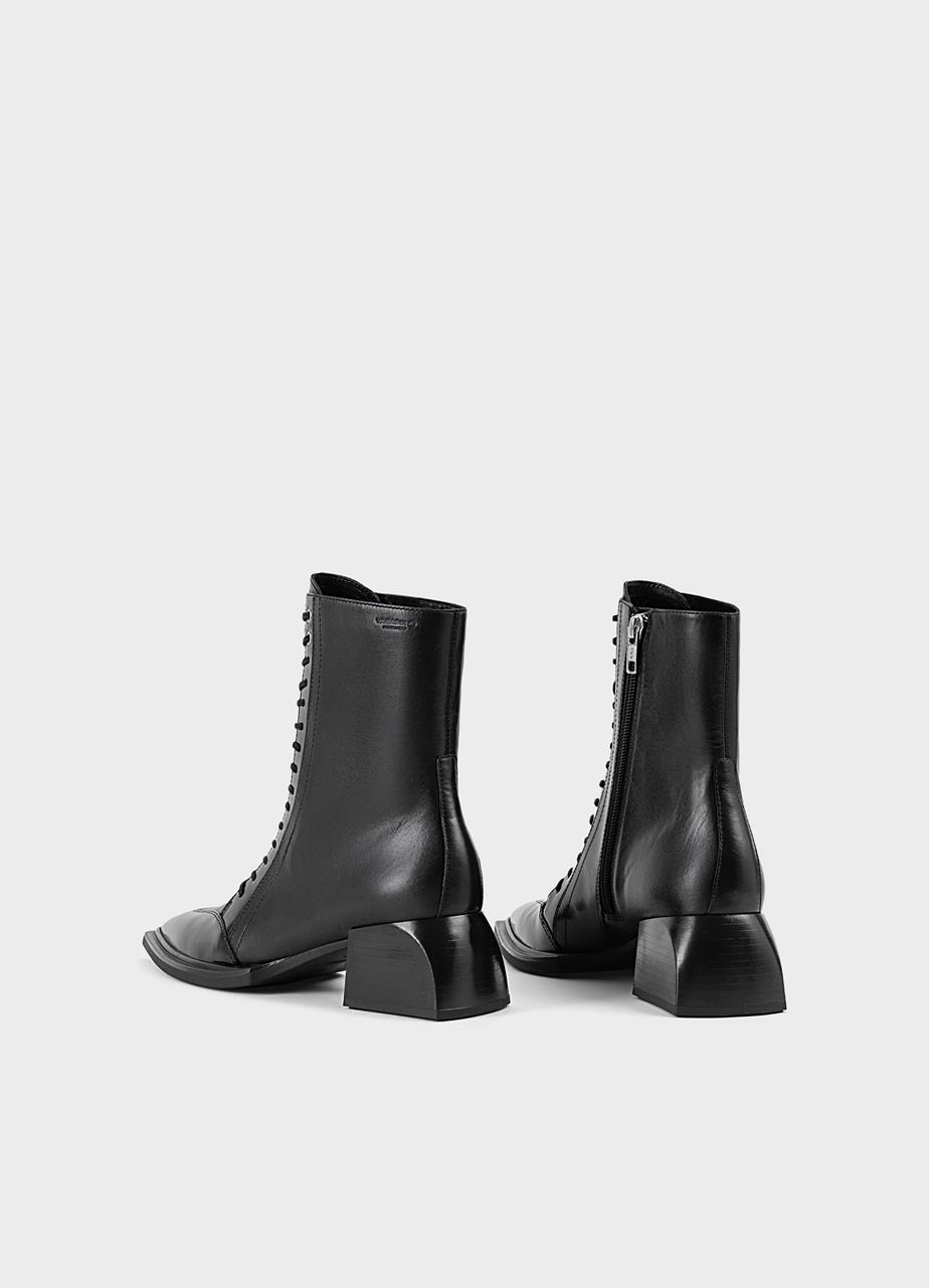 Vivian boots Black leather/comb