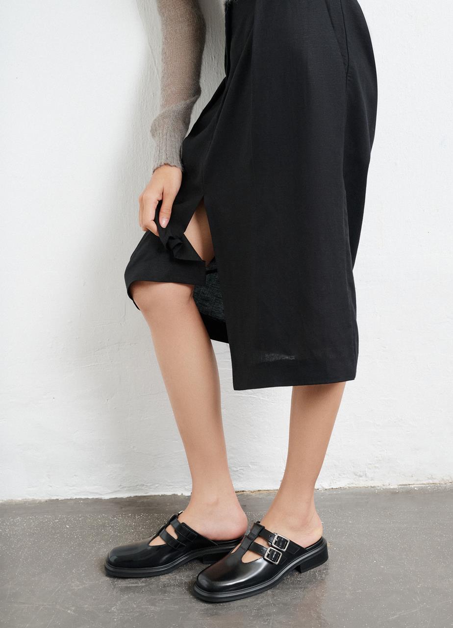 Ellis mules Schwarzes, Poliertes Leder